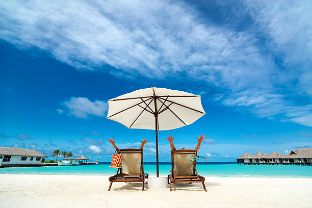 istock Couple on a tropical beach at Maldives 510874641