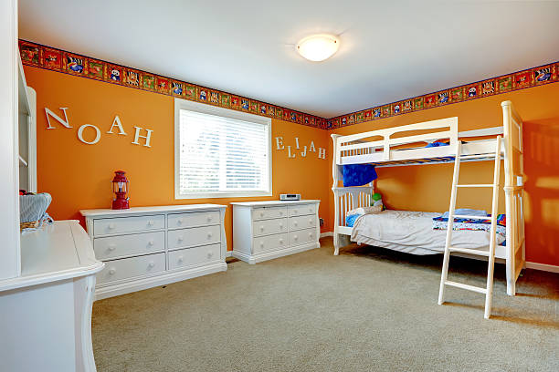 istock Bright orange kids room with bulk bed 510898779