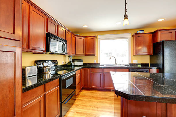 istock Kitchen room with black granite tops 510898869