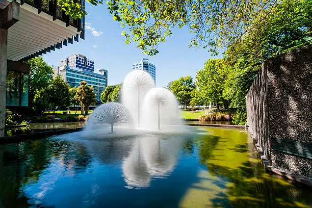 Christchurch New Zealand Ferrier Fountain Victoria Square - The Ferrier Fountain, Victoria Square, Christchurch, New Zealand, on a sunny summer day. Taken before the earthquakes of 2010-11, the fountain survived the quakes but most of the buildings did not.