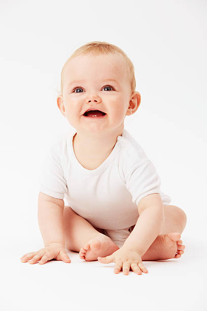istock Young baby boy with mouth open, studio 510901133