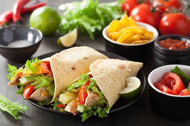 istock mexican tortilla wrap with chicken breast and vegetables 510902007