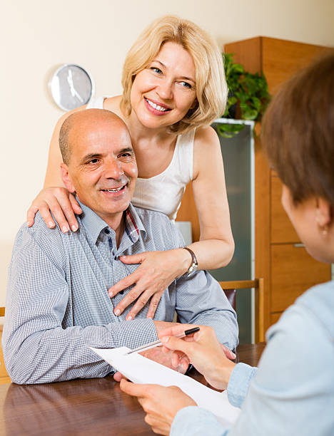 istock Mature couple filling questionnaire 510902881