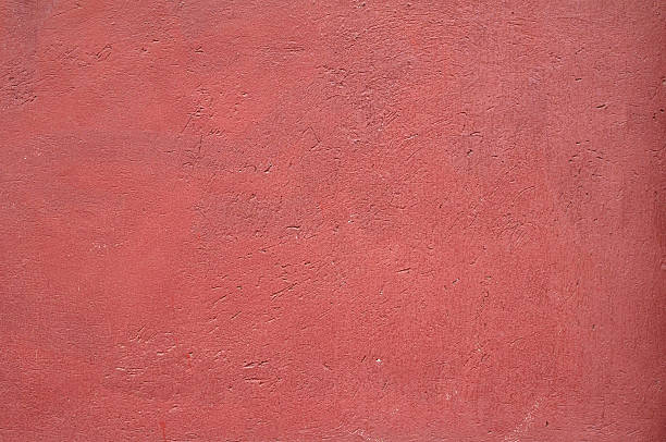 istock Texture of old wall covered with red stucco 510903105