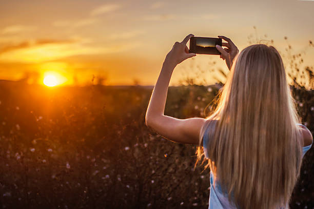 istock Capturing the sunset with a smartphone 510903667