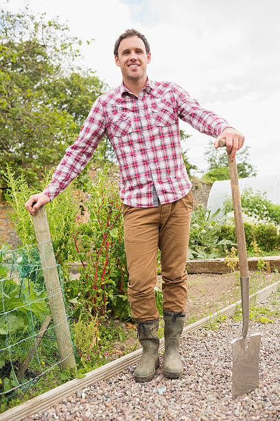 istock Proud young man wearing a check shirt posing 510905419
