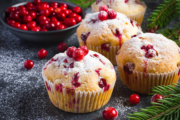 Cranberry muffins with powdered sugar