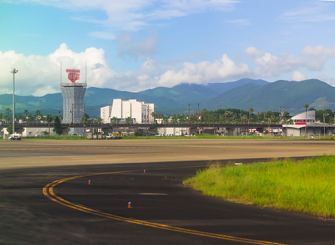 View from coming plane on runway of Miyazaki Airport on island Kyushu in Japan.