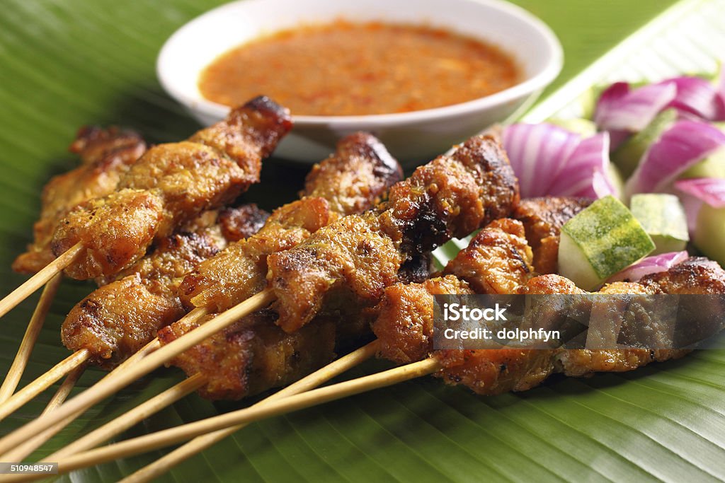 Satay Malaysian chicken satay with delicious peanut sauce, one of famous local dishes.. Satay Stock Photo Satay Malaysian chicken satay with delicious peanut sauce, one of famous local dishes.. Satay Stock Photo