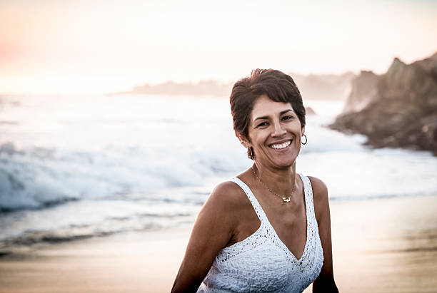 istock Latin Woman on Beach 510950171