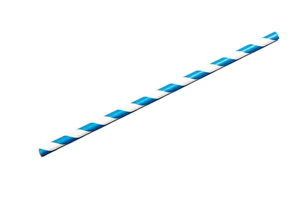 A single blue drinking straw in retro style with blue and white stripes on white background