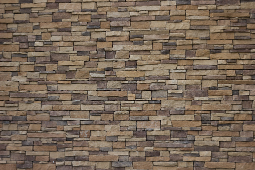 brown stone brick wall background.