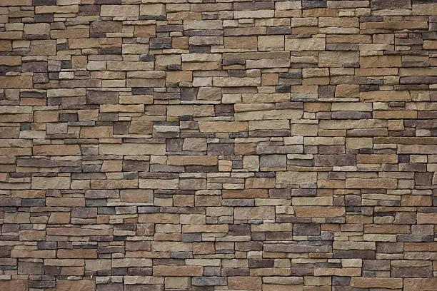 Photo of Stone wall background.