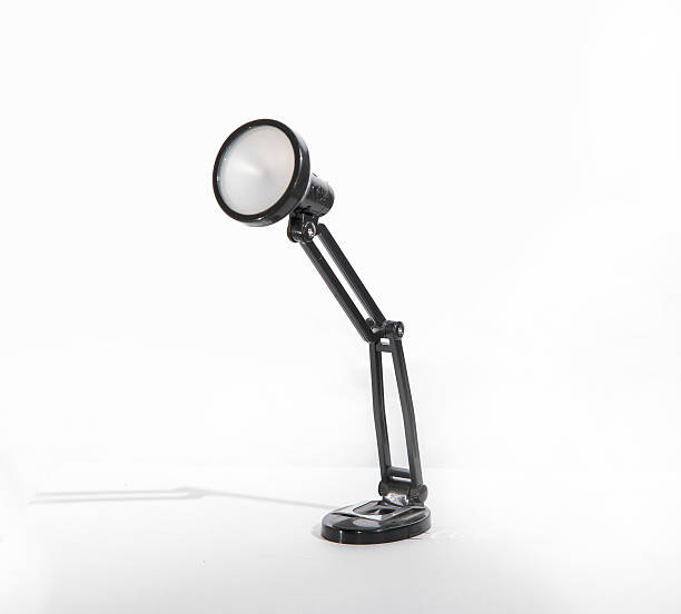 isolato lampada anglepoise. - fashionable studio shot indoors lifestyles foto e immagini stock