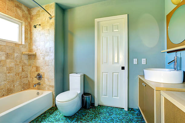 istock Bathroom interior in light blue with tile wall trim 510952283