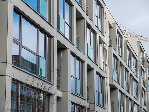 istock Modern Apartment Building with Large Windows 510953094