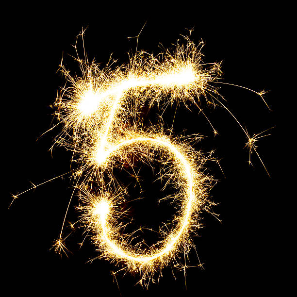 istock sparkling number 5 on black background 510953331