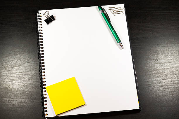 istock Open notebook with blank pages and pencil 510953902