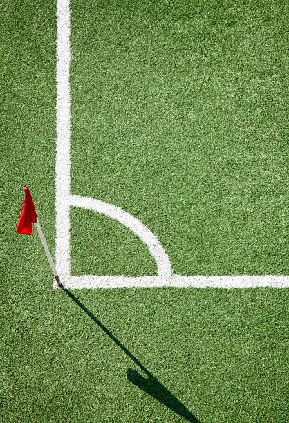 Yellow corner flag on an soccer field