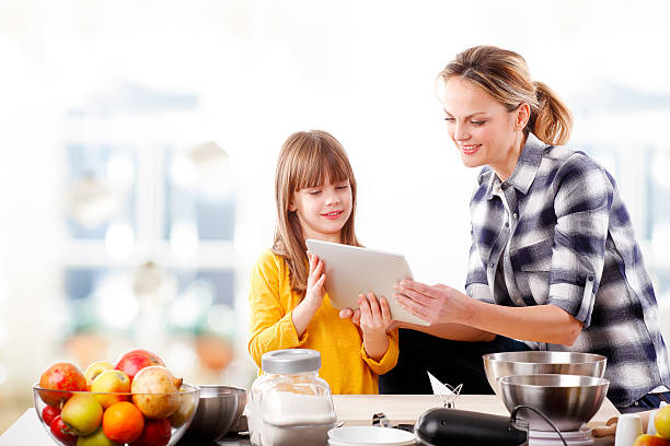 istock Mother and daughter in the kitchen 510954974