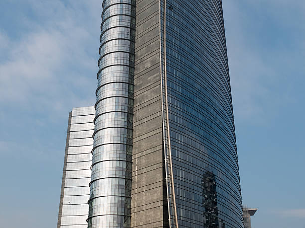 istock Modern Curved Skyscraper with Shiny Glass Facade 510955432
