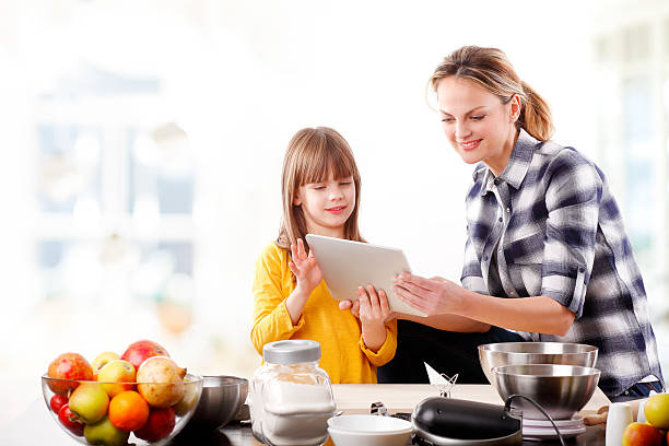 istock Mother and daughter in the kitchen 510956536
