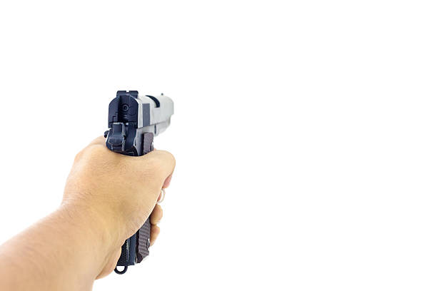 istock Hand holding a handgun. 510961528