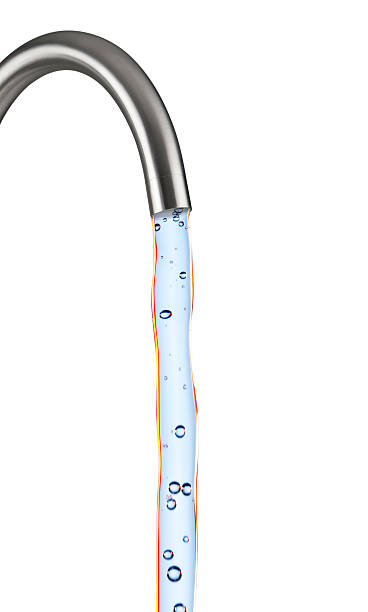 istock tap with blue water jet and air bubbles 510962672