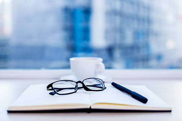 Glasses in the focus, workspace, laptop