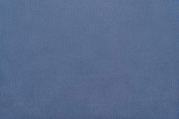 istock textured background from textile fabric of pale blue color 510969104