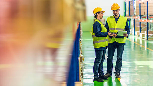 istock Coworkers in Warehouse 510974197