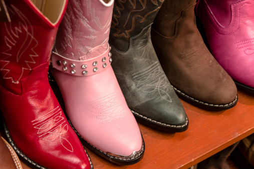 Colorful display of girls cowboy boots