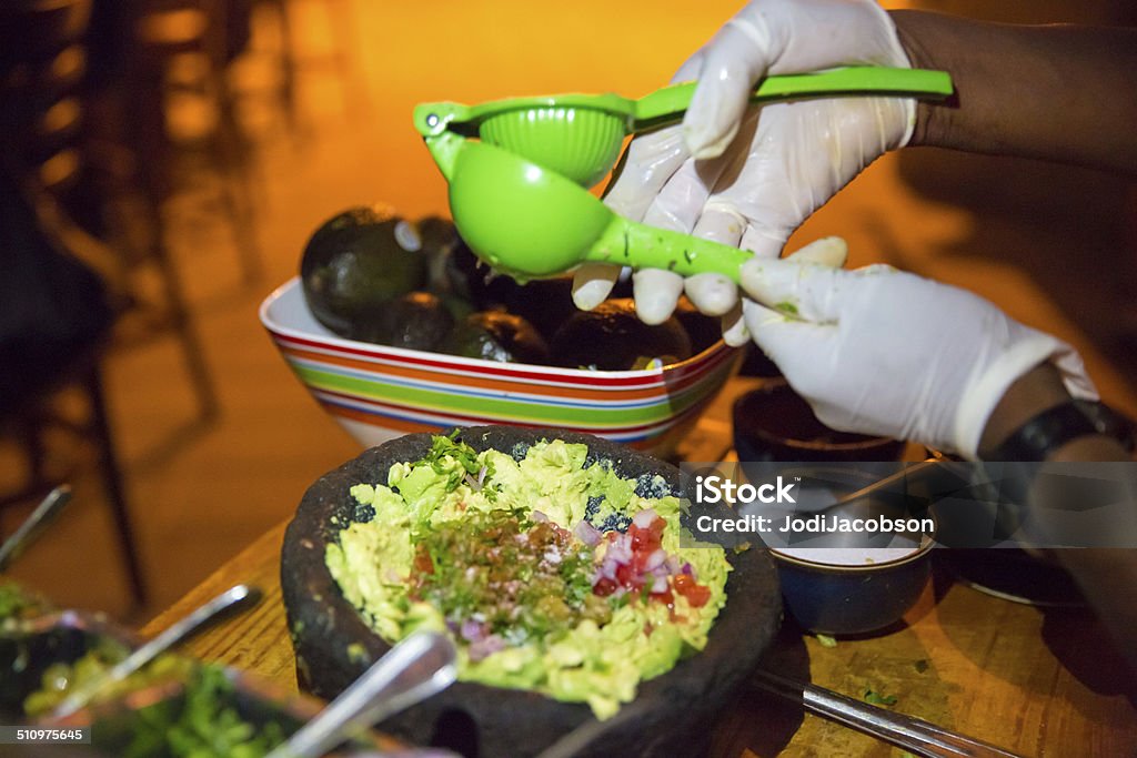 Guacamole being prepared from scratch Handmade guacamole being prepared from scratch.  rr Avocado Stock Photo