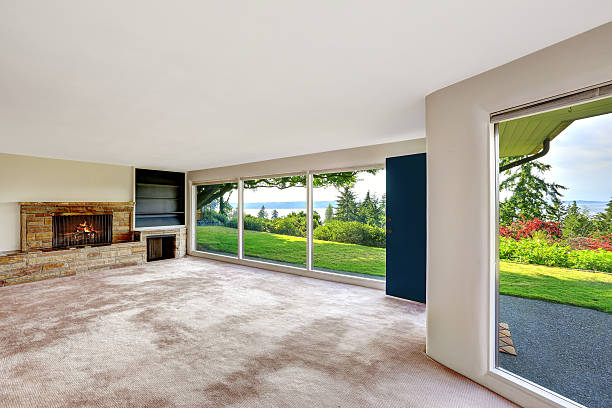 istock Spacious empty living room with walkout basement overlooking bea 510975935