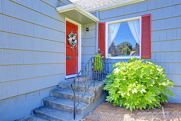 istock Cozy small house exterior with red details 510975949