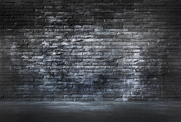 Black Brick Wall and Cement Floor Black Brick Wall and Cement Floor fortified wall stock pictures, royalty-free photos & images