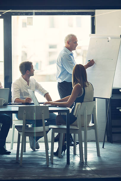 Businesspeople having meeting in office.