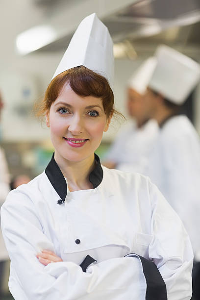 istock Female chef posing proudly in a kitchen 510980067