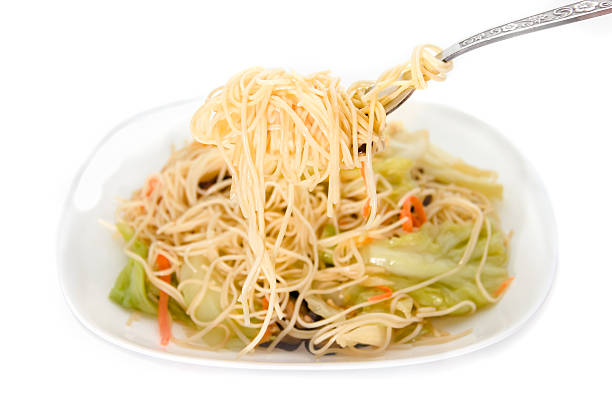 istock Stir fried noodles on white background ,Chinese food 510980897