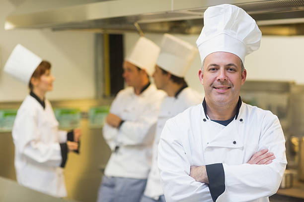 istock Mature male chef posing proudly in a kitchen 510981017