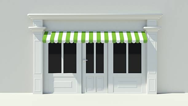 istock Sunny Shopfront with large windows White store facade 510981413