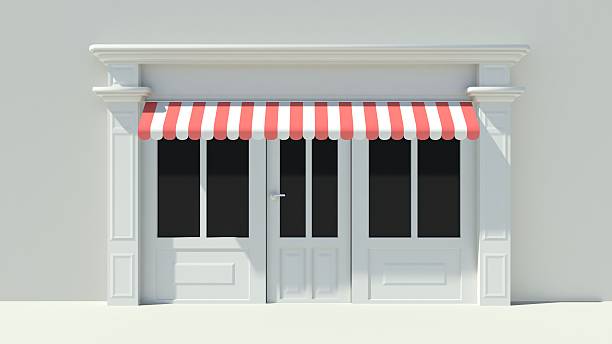 istock Sunny Shopfront with large windows White store facade 510981485