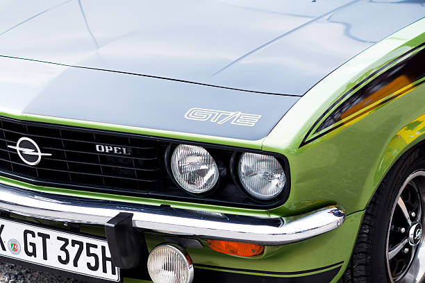 Essen, Germany - September 7, 2014: Green Opel GTE oldtimer with black engine bonnet. Seen on oldtimer meeting at Zeche Zollverein in Essen.