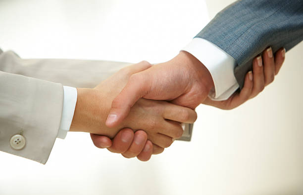 istock Handshake of partners 510995525