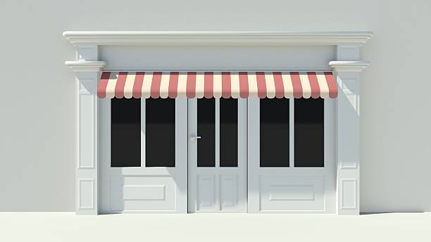 istock Sunny Shopfront with large windows White store facade 510995631