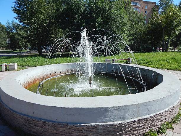 istock small fountain in the Park. 510995685