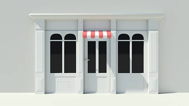 istock Sunny Shopfront with large windows White store facade 510996031