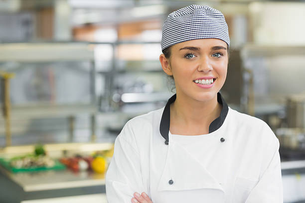 istock Young female chef smiling at the camera 510998119