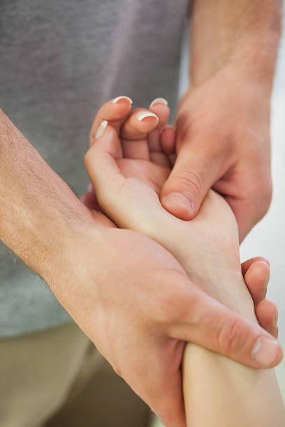 istock Patients hand being massaged by physiotherapist 510998807