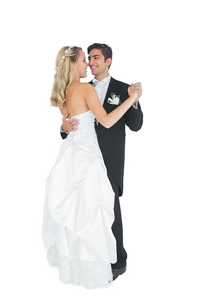 istock Cute young married couple dancing viennese waltz 511001957